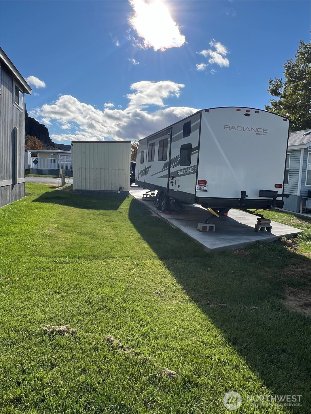 31465 Moore Road Northeast, Unit 616 Coulee City, WA 99115 - Photo 9 of 19 a view of a house with a yard porch and sitting area