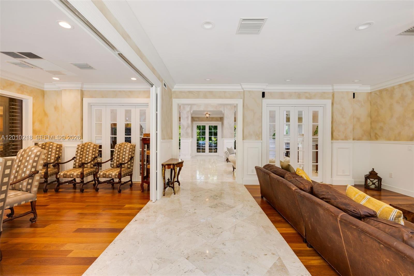 6905 Southwest 75th Avenue Miami, FL 33143 - Photo 15 of 85 a living room with furniture and wooden floor