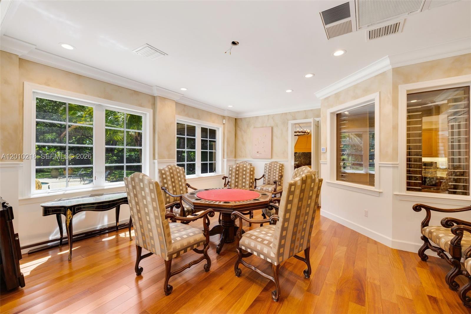 6905 Southwest 75th Avenue Miami, FL 33143 - Photo 16 of 85 a view of a dining room with furniture windows and wooden floor