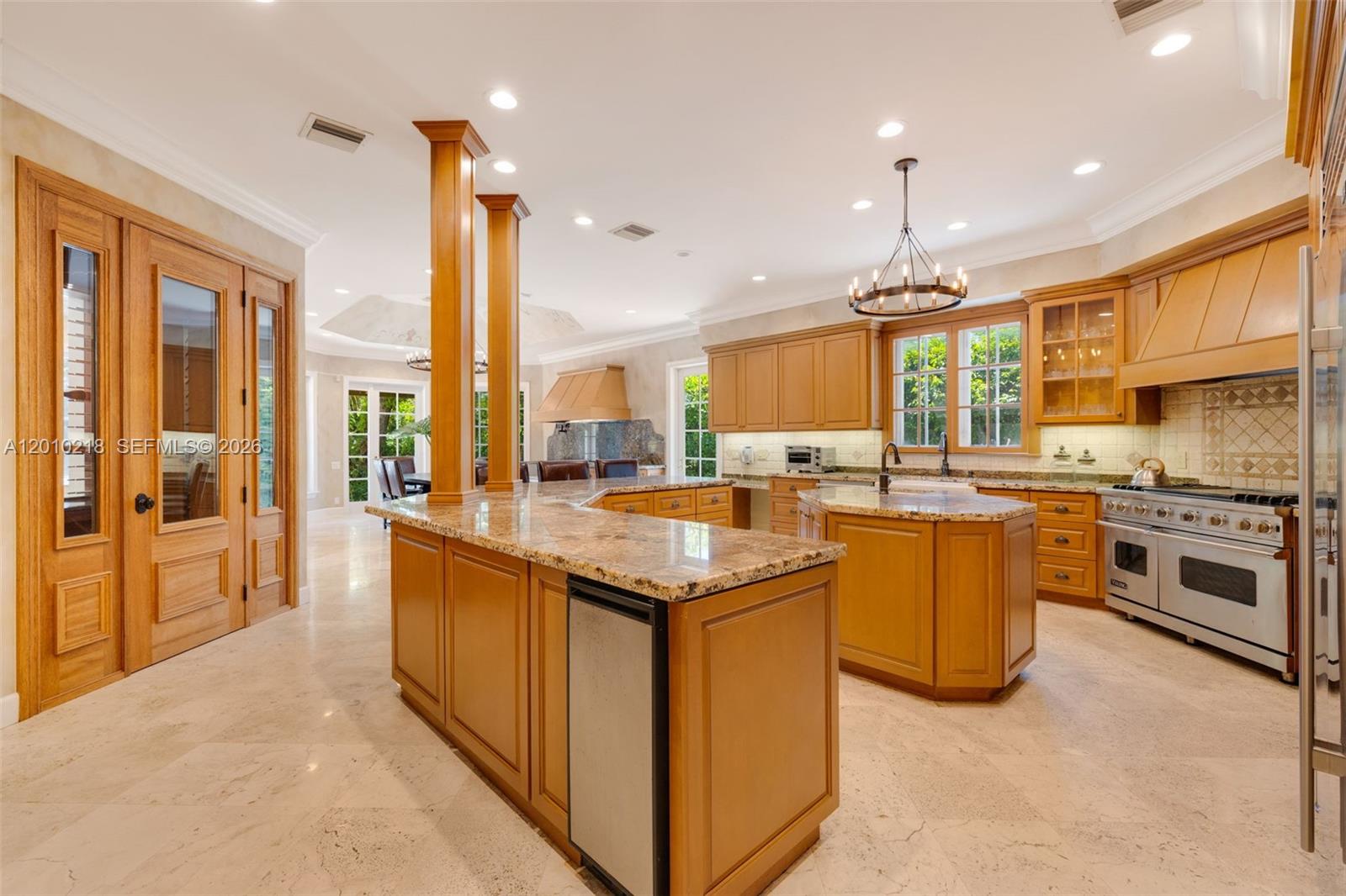 6905 Southwest 75th Avenue Miami, FL 33143 - Photo 18 of 85 a kitchen with stainless steel appliances granite countertop a stove a sink a oven and a refrigerator