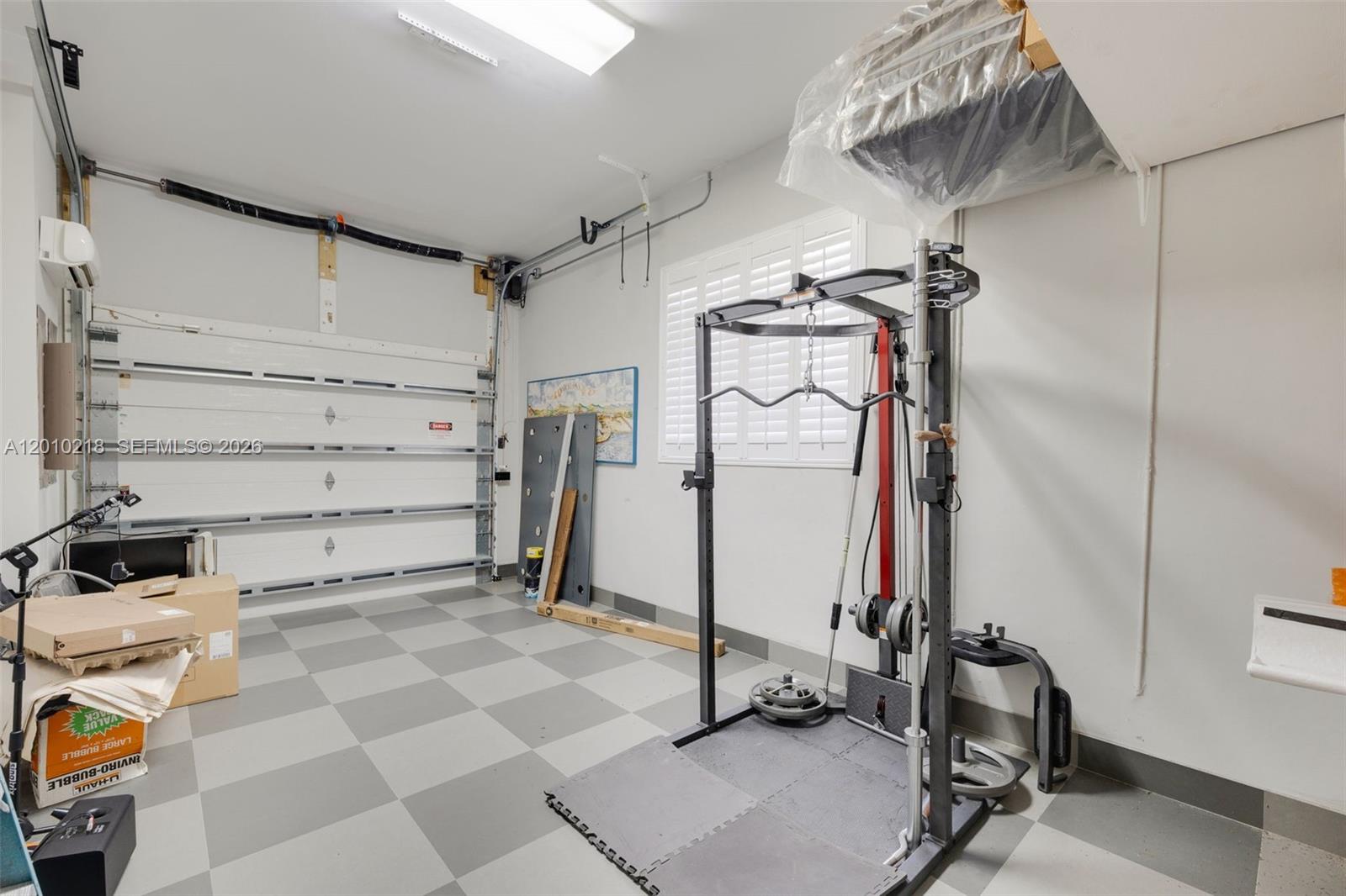 6905 Southwest 75th Avenue Miami, FL 33143 - Photo 29 of 85 a view of a room with gym equipment
