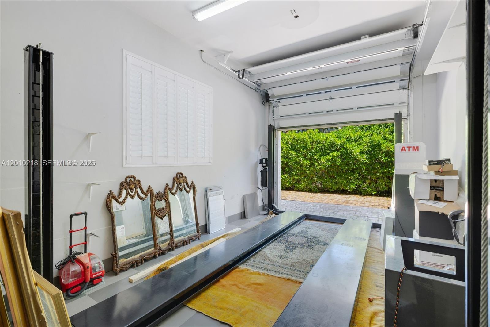6905 Southwest 75th Avenue Miami, FL 33143 - Photo 30 of 85 a view of swimming pool with a couch and the floor to ceiling window