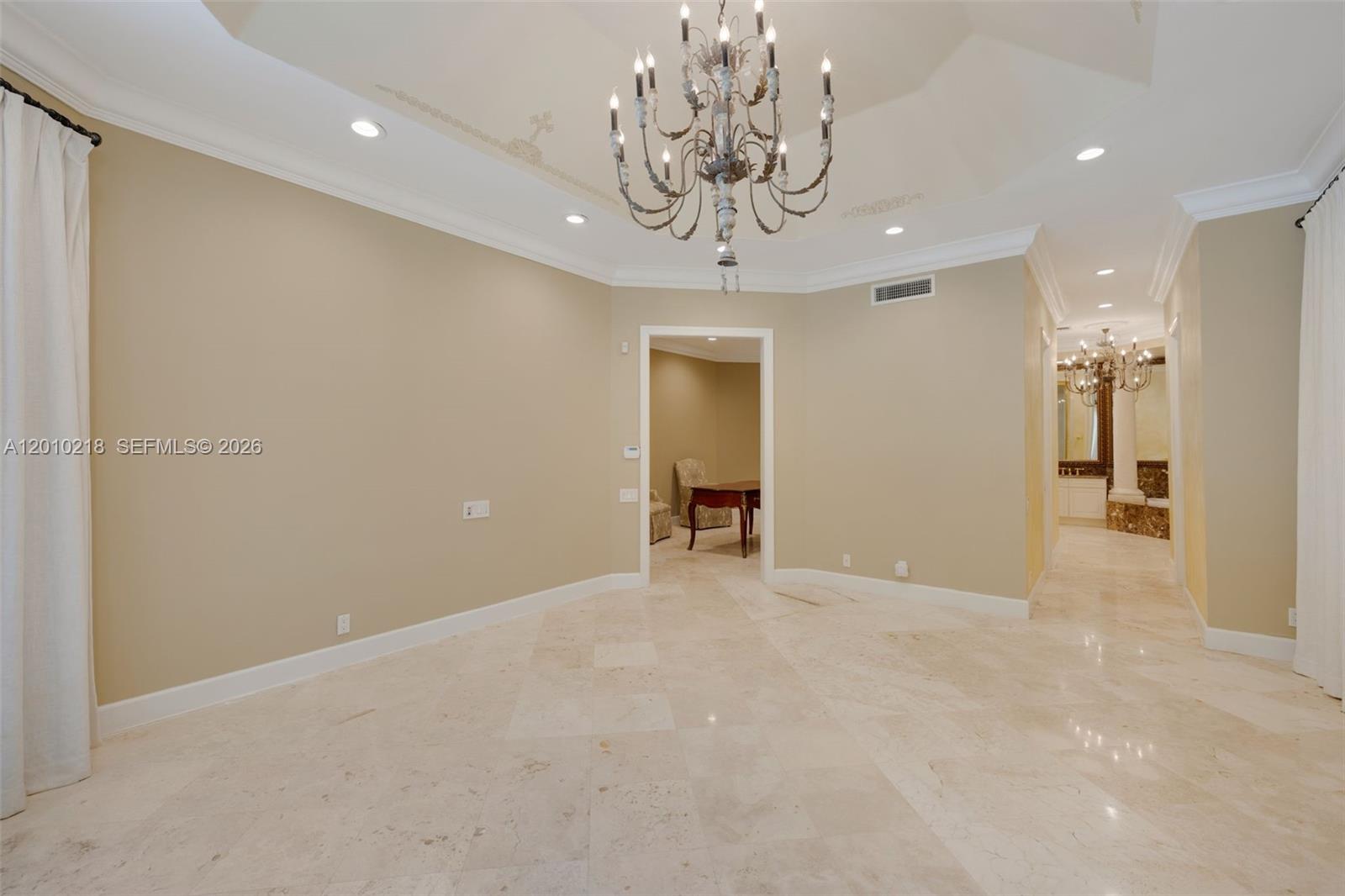 6905 Southwest 75th Avenue Miami, FL 33143 - Photo 36 of 85 a view of a hallway with a chandelier
