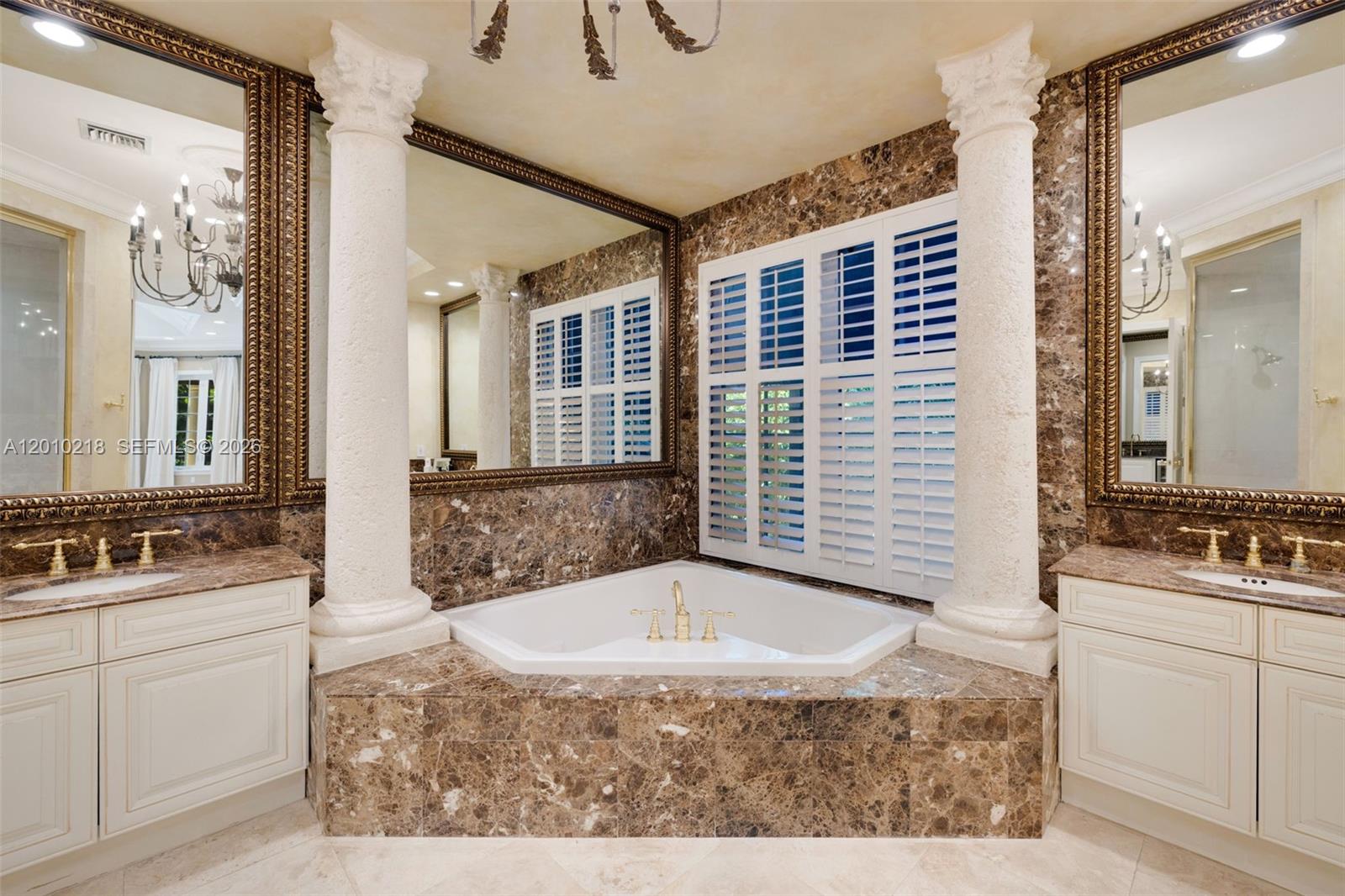 6905 Southwest 75th Avenue Miami, FL 33143 - Photo 38 of 85 a bathroom with a granite countertop sink and a mirror