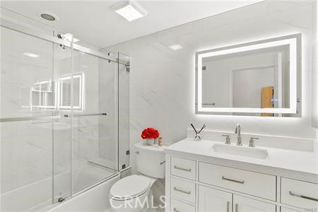 5 Argo Irvine, CA 92603 - Photo 13 of 24 a bathroom with a sink vanity granite tub and shower