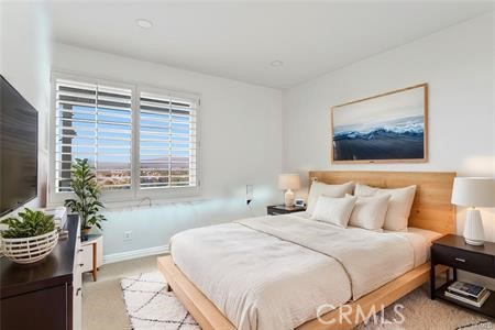 5 Argo Irvine, CA 92603 - Photo 17 of 24 a bedroom with a bed and a potted plant