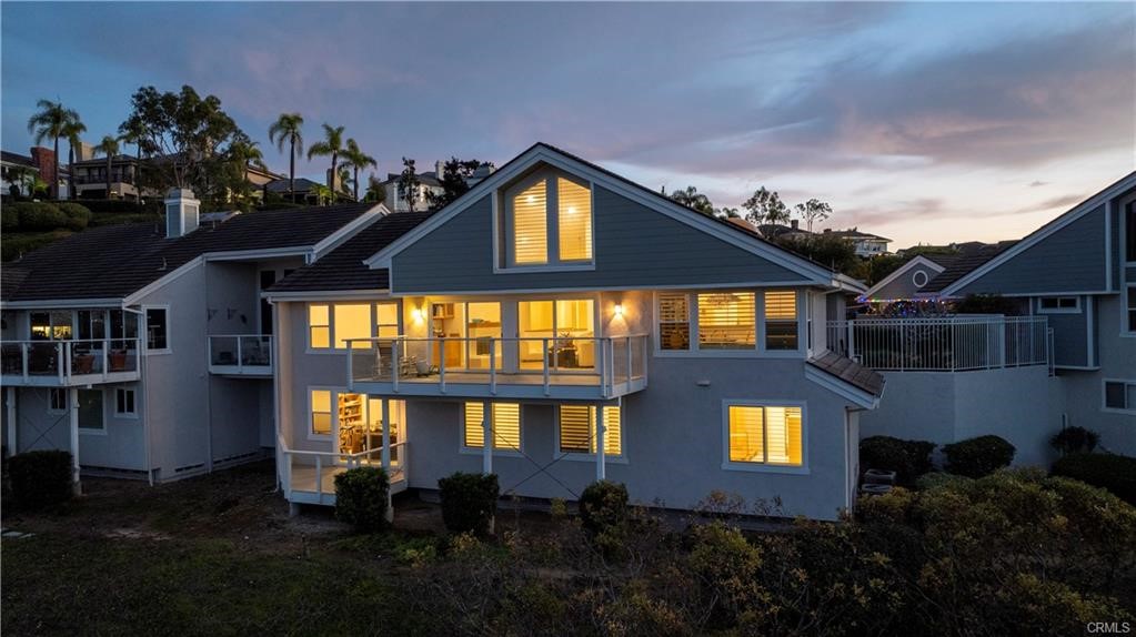 5 Argo Irvine, CA 92603 - Photo 24 of 24 a front view of a house with a yard and potted plants