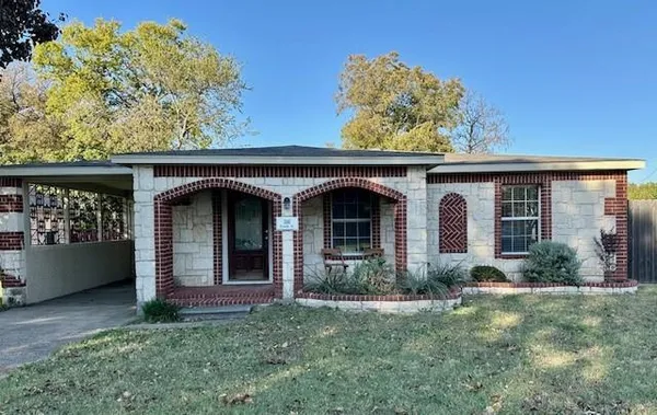 front view of a house with a small yard