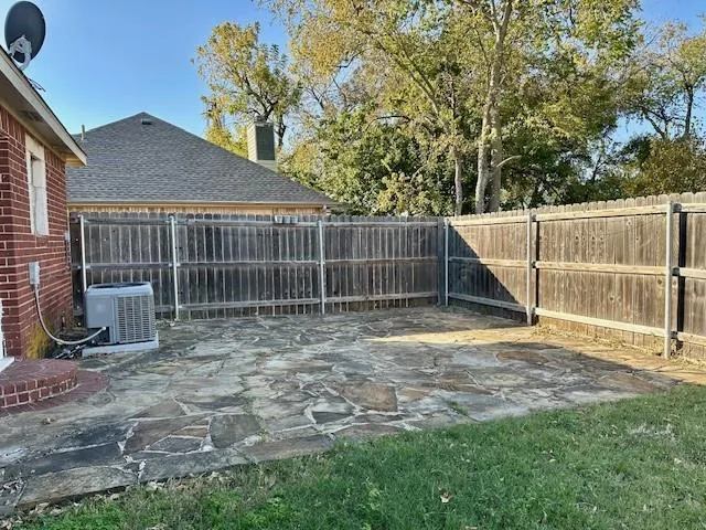 a garden view with a seating space
