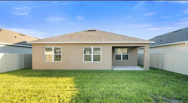 a front view of house with yard