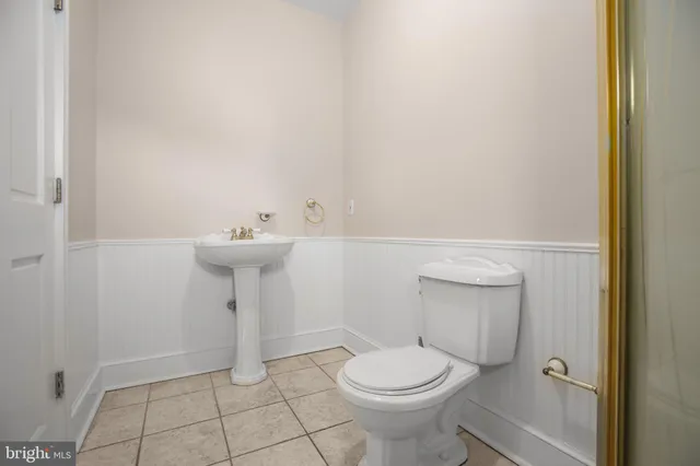 a kitchen with a stove cabinets and refrigerator