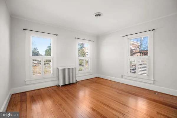 a view of a chair and table in the balcony