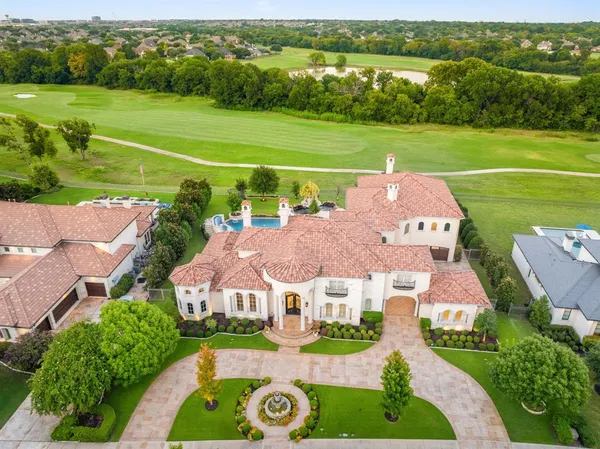 an aerial view of a house with a garden view