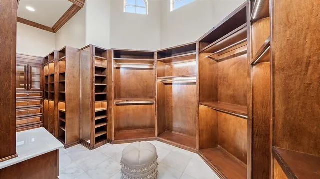 a bathroom with a shower and a sink