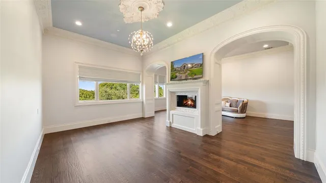 a view of livingroom with furniture and a fireplace