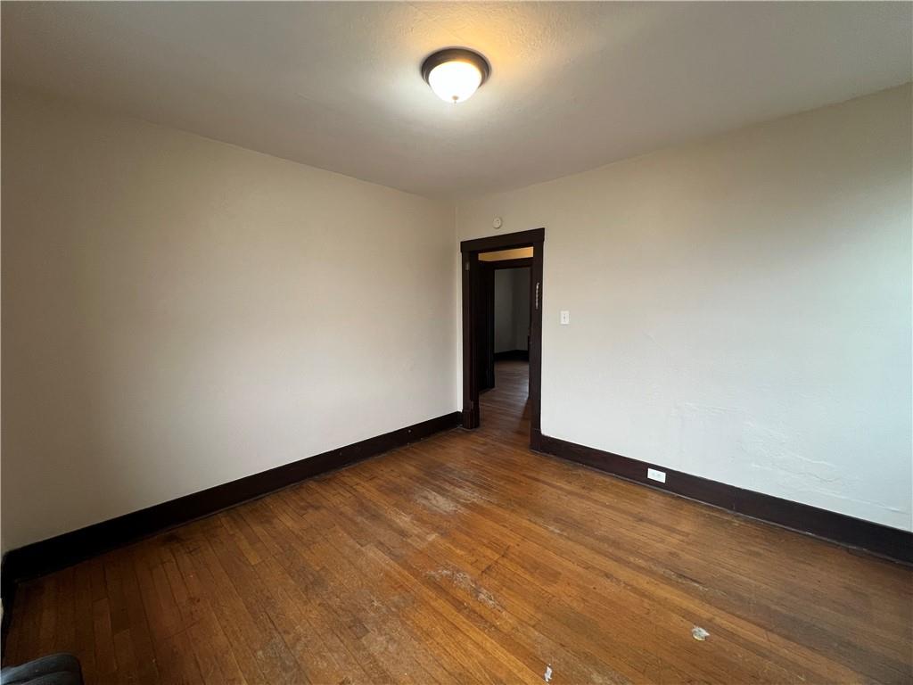 216 Suncrest Street Pittsburgh, PA 15210 - Photo 20 of 32 a view of an empty room and window