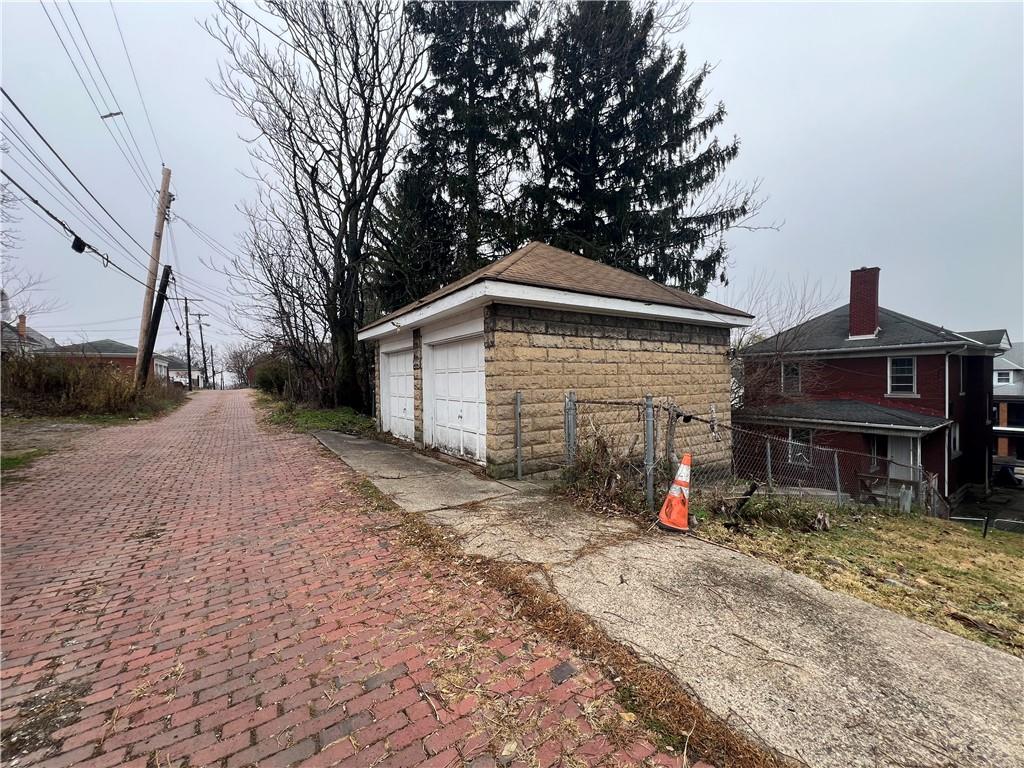 216 Suncrest Street Pittsburgh, PA 15210 - Photo 29 of 32 a view of a house with a yard