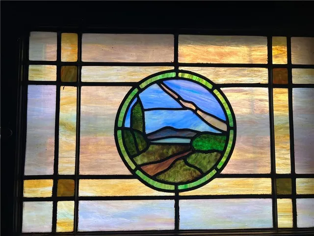 a view of swimming pool from a window