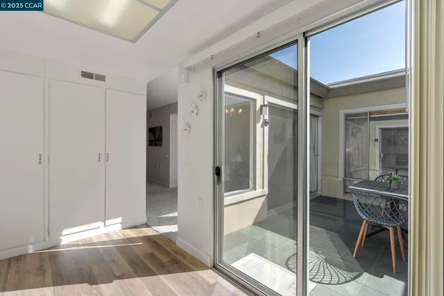 a view of elevator with wooden floor