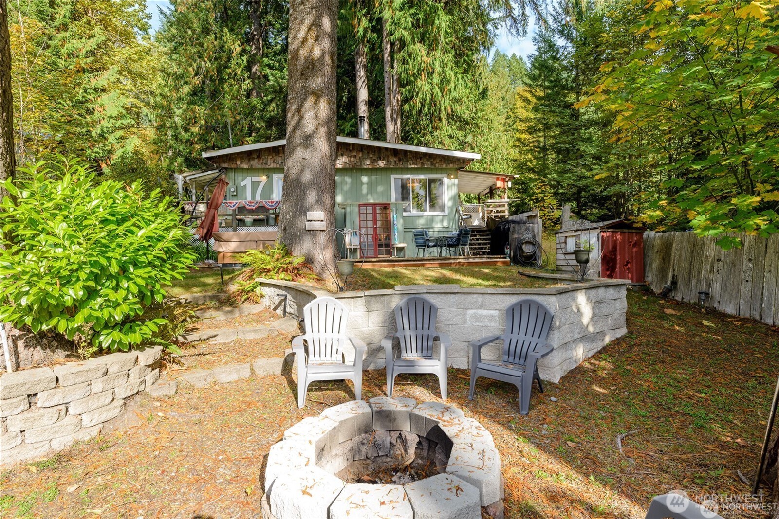 17 Thompson Point Road Port Angeles, WA 98363 - Photo 15 of 24 a view of a house with backyard and sitting area