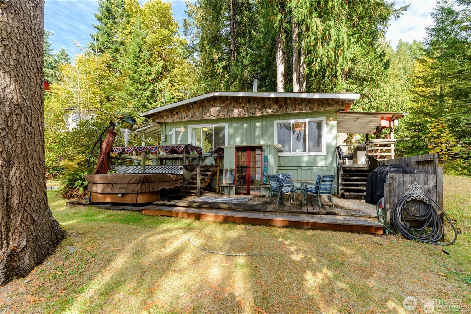 17 Thompson Point Road Port Angeles, WA 98363 - Photo 2 of 24 a view of a house with swimming pool and sitting area
