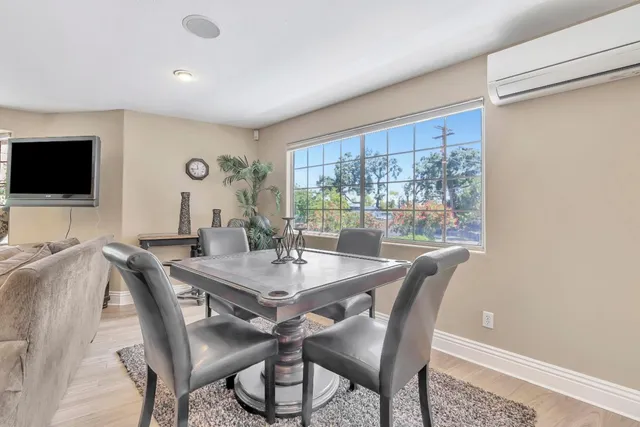 a view of front door with wooden floor