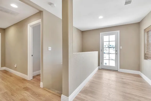 a bedroom with a bed and a closet