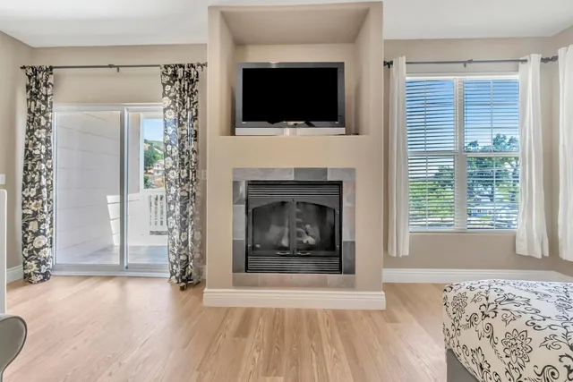 a kitchen with white cabinets and a sink