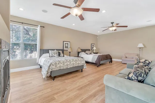 a bathroom with a bathtub and window