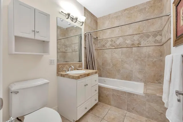 a table and chairs in front of a house