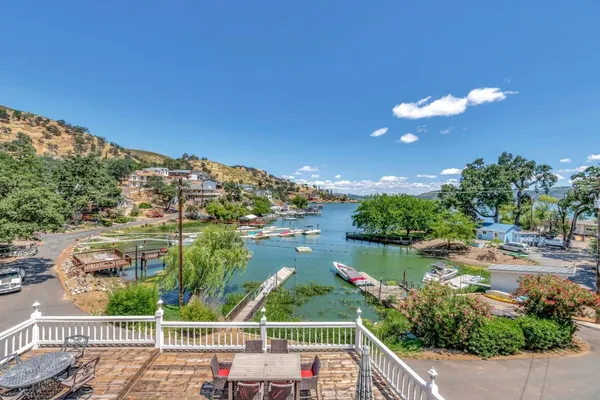 a view of a swimming pool with brick wall