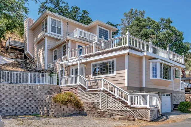 a view of a swimming pool with brick wall
