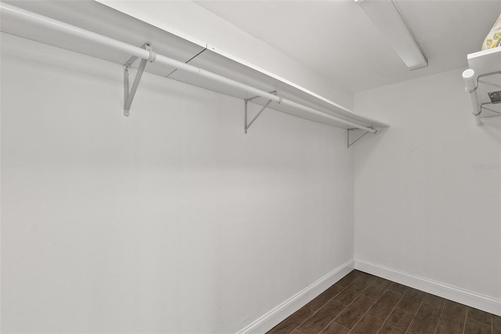 100 Pierce Street, Unit 1007 Clearwater, FL 33756 - Photo 18 of 40 a view of small space with racks on the wall