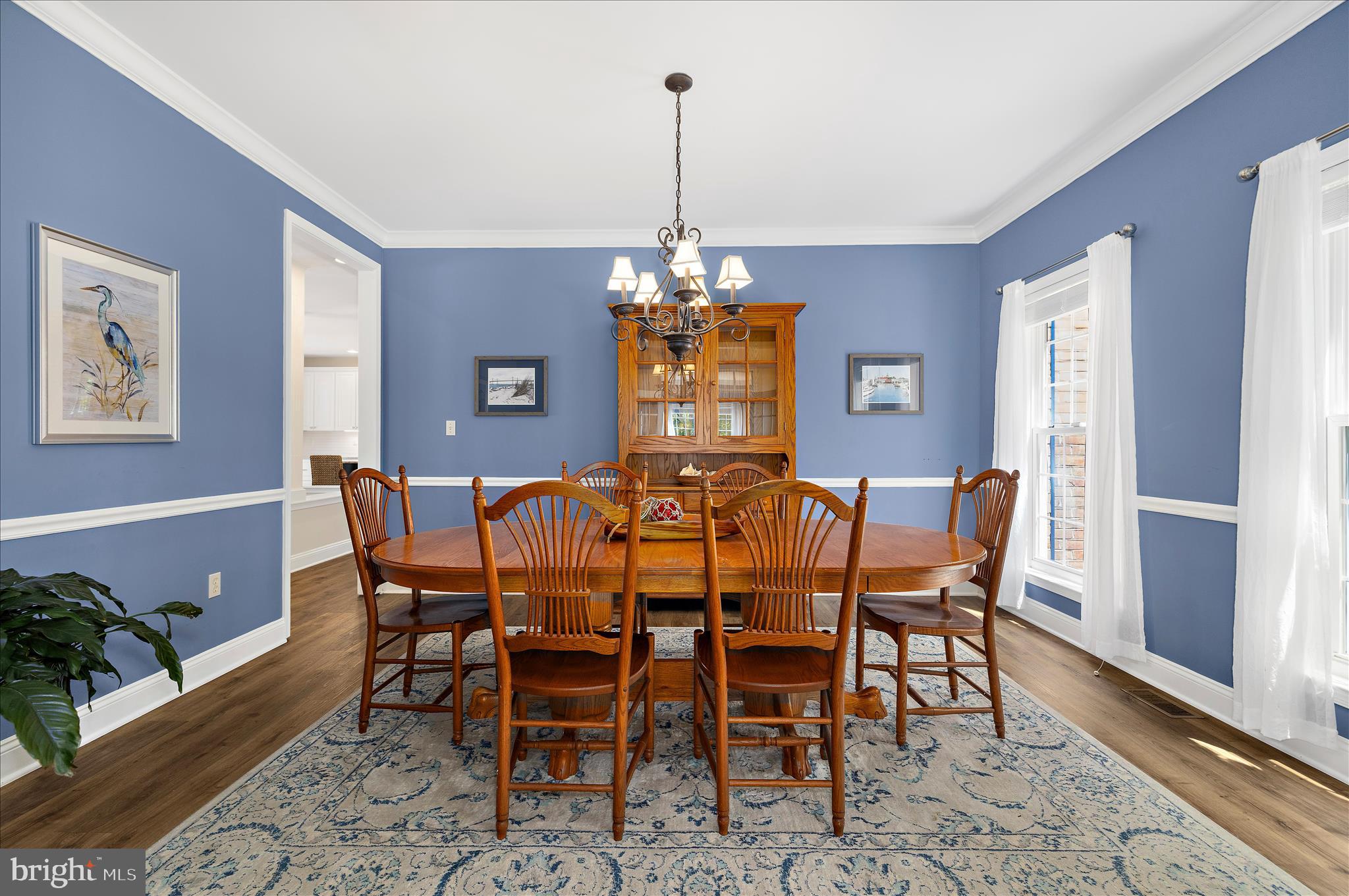 470 Jumpers Hole Road Severna Park, MD 21146 - Photo 11 of 72 a view of a dining room with furniture window and wooden floor