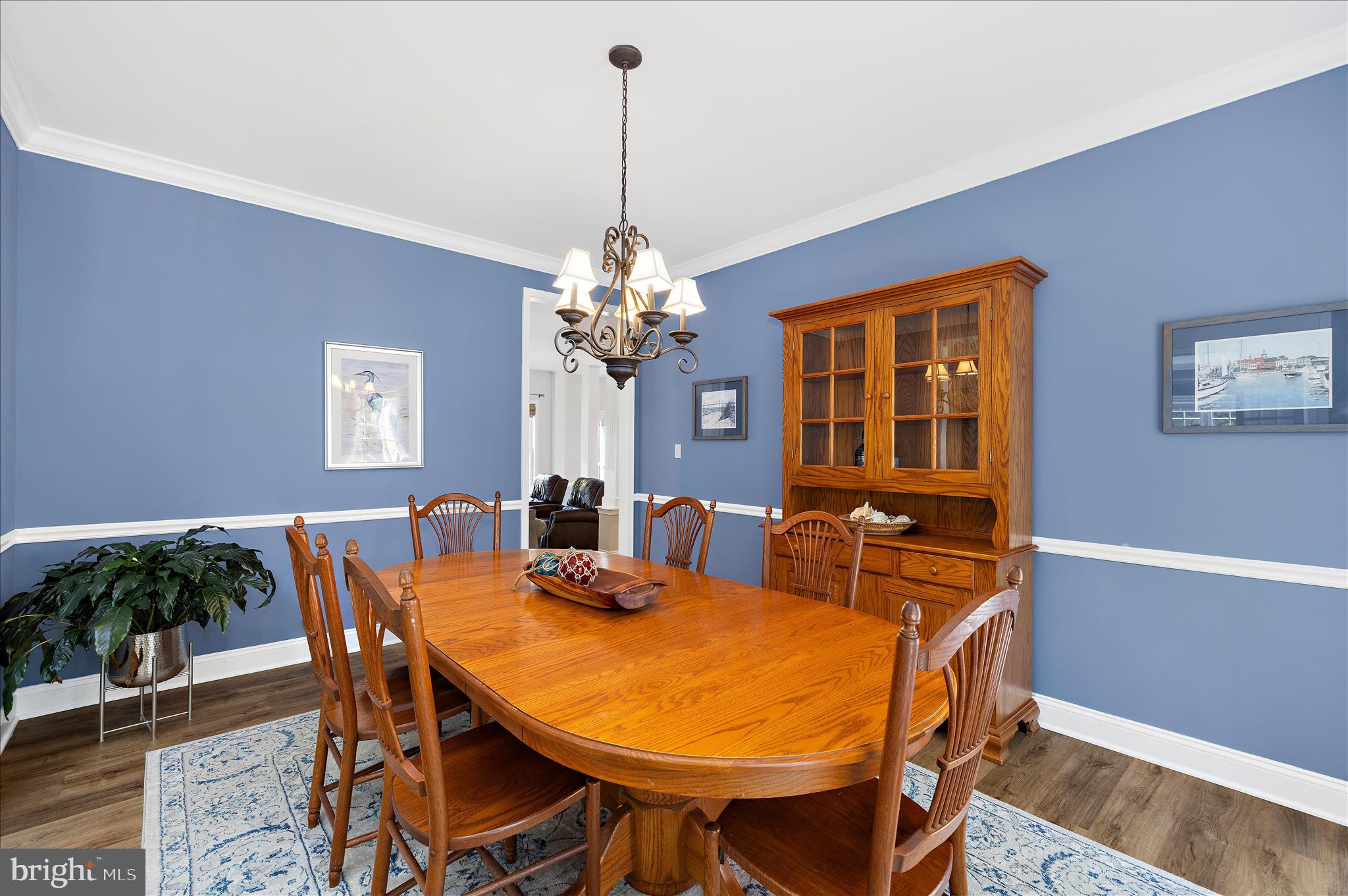 470 Jumpers Hole Road Severna Park, MD 21146 - Photo 12 of 72 a dining room with furniture a chandelier and wooden floor