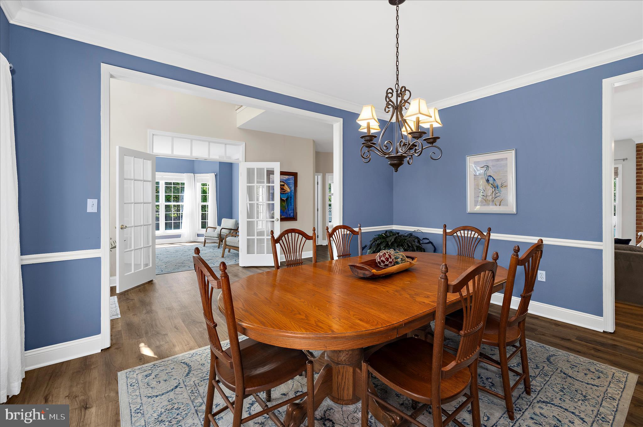 470 Jumpers Hole Road Severna Park, MD 21146 - Photo 13 of 72 a view of a dining room with furniture and chandelier