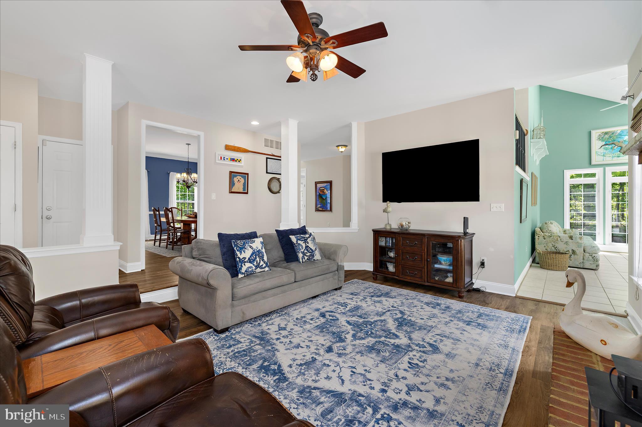 470 Jumpers Hole Road Severna Park, MD 21146 - Photo 21 of 72 a living room with furniture a fireplace and a flat screen tv