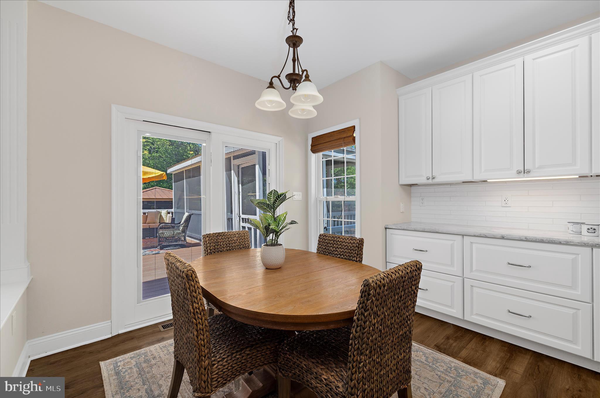 470 Jumpers Hole Road Severna Park, MD 21146 - Photo 22 of 72 a view of a dining room with furniture and wooden floor