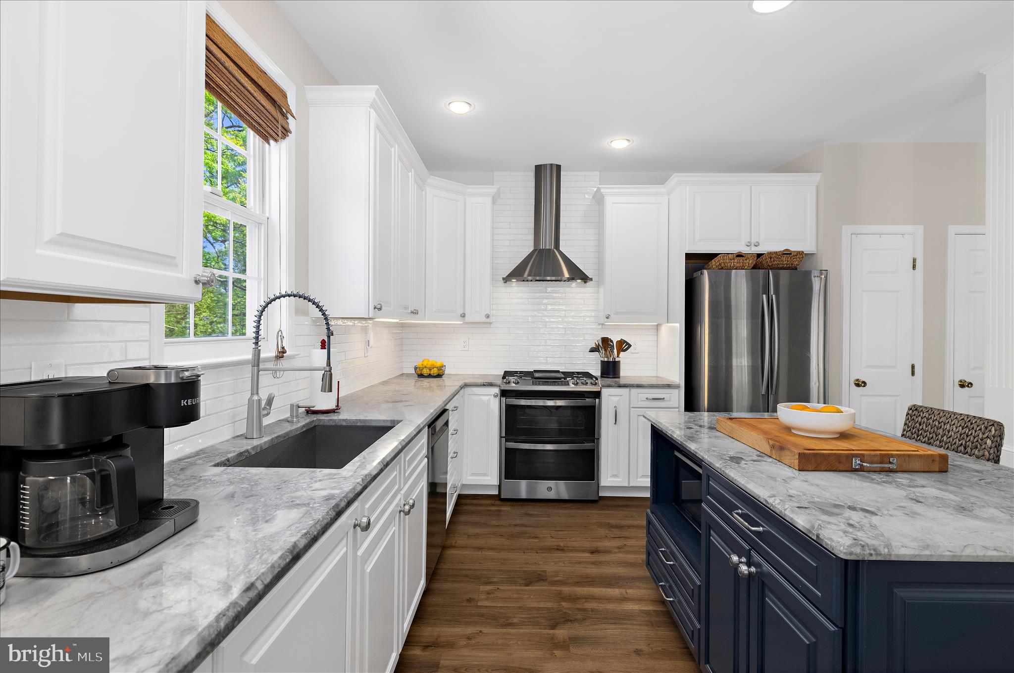 470 Jumpers Hole Road Severna Park, MD 21146 - Photo 24 of 72 a kitchen with stainless steel appliances granite countertop a sink stove and refrigerator
