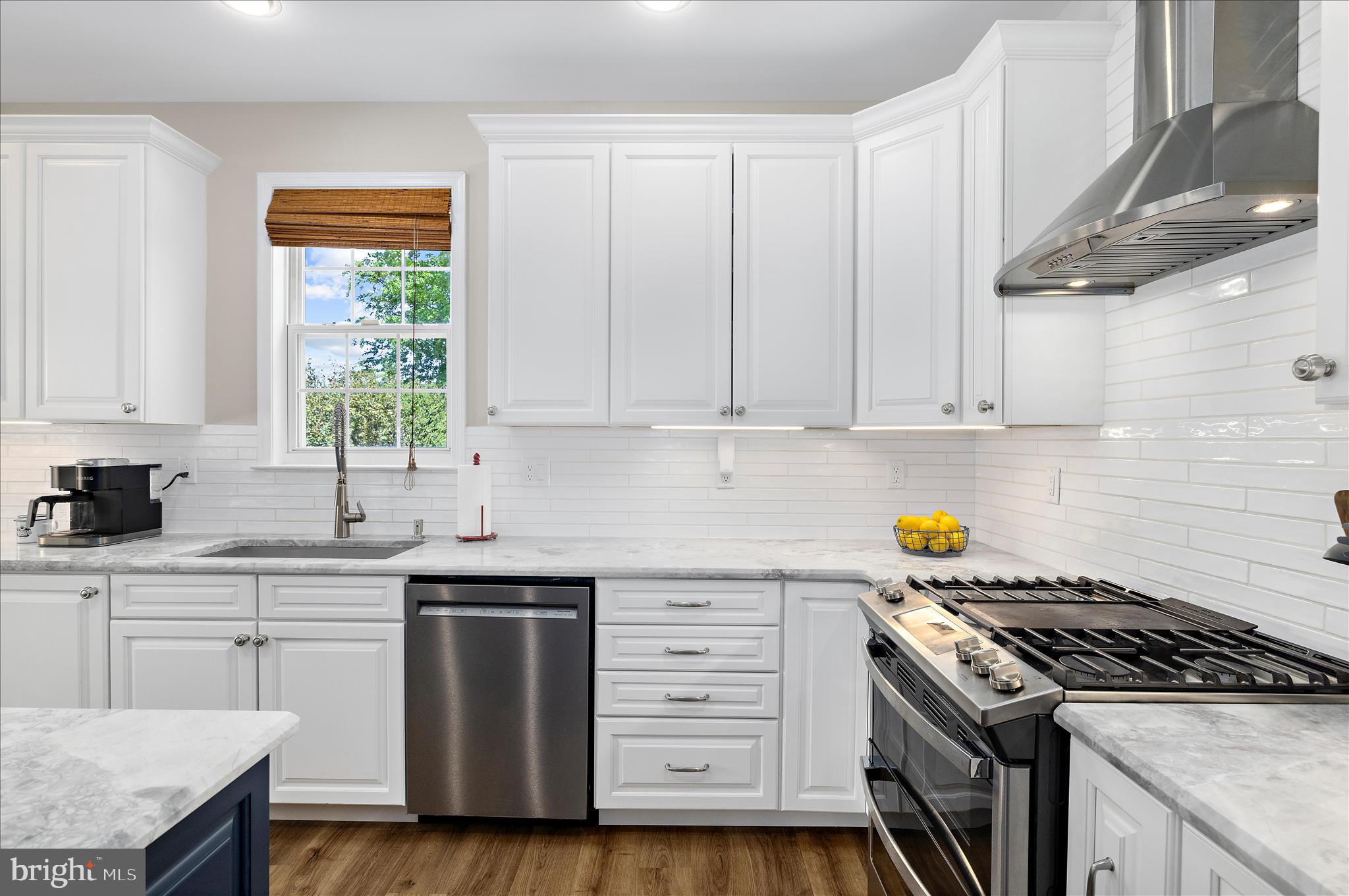 470 Jumpers Hole Road Severna Park, MD 21146 - Photo 26 of 72 a kitchen with granite countertop stainless steel appliances a stove a sink and a window
