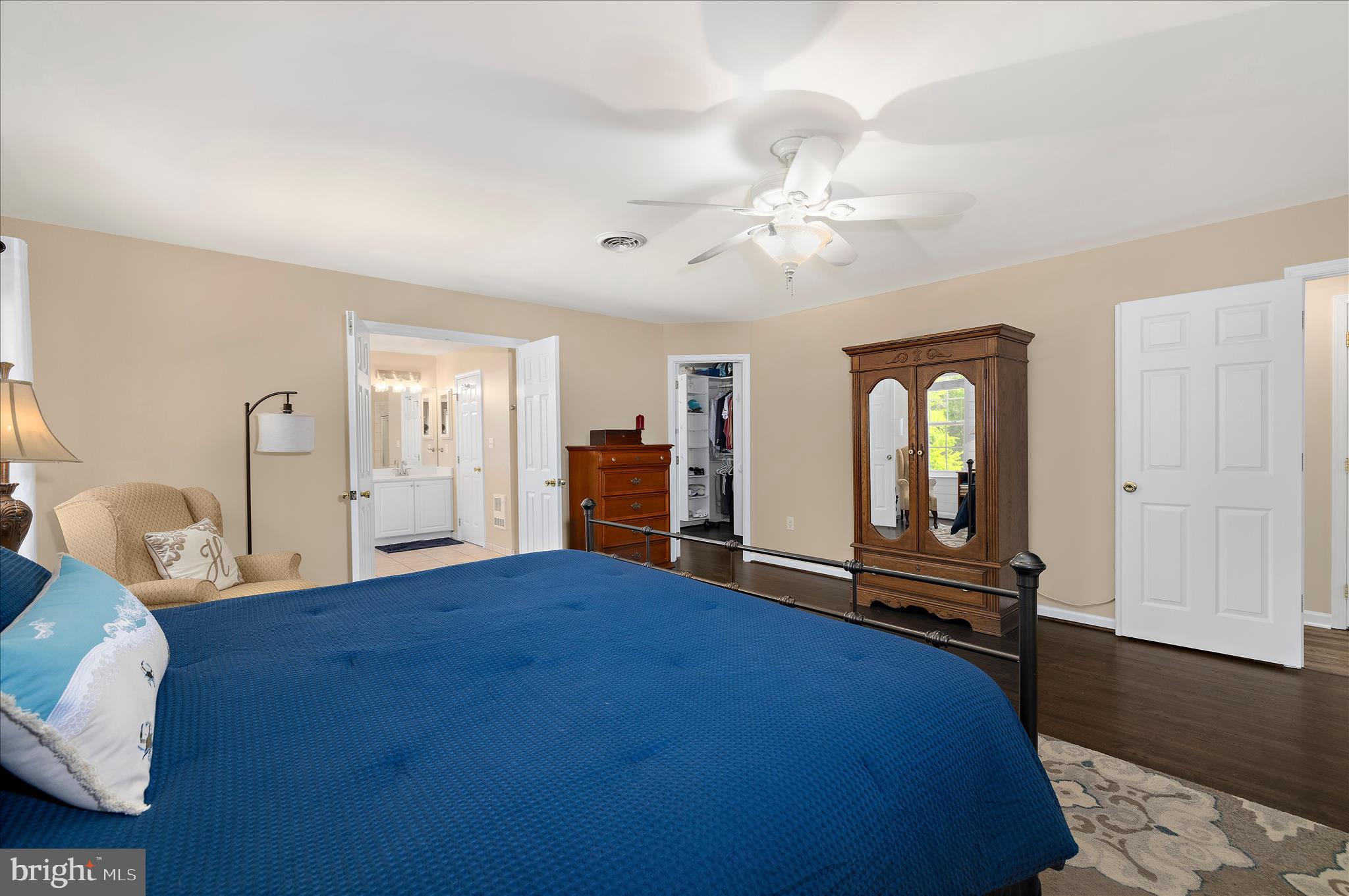 470 Jumpers Hole Road Severna Park, MD 21146 - Photo 33 of 72 a bedroom with a bed and a chandelier