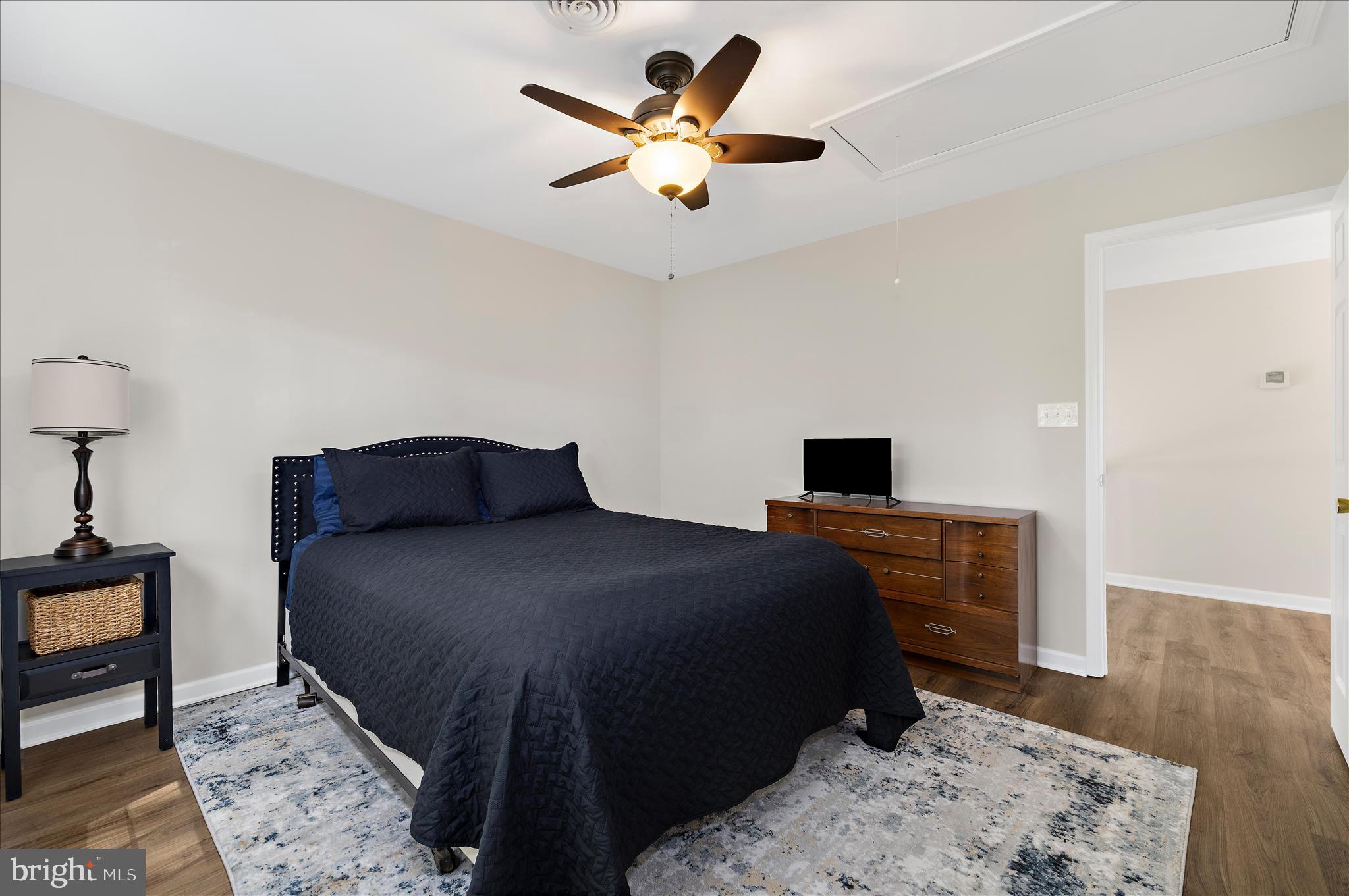 470 Jumpers Hole Road Severna Park, MD 21146 - Photo 40 of 72 a bedroom with a bed and a dresser