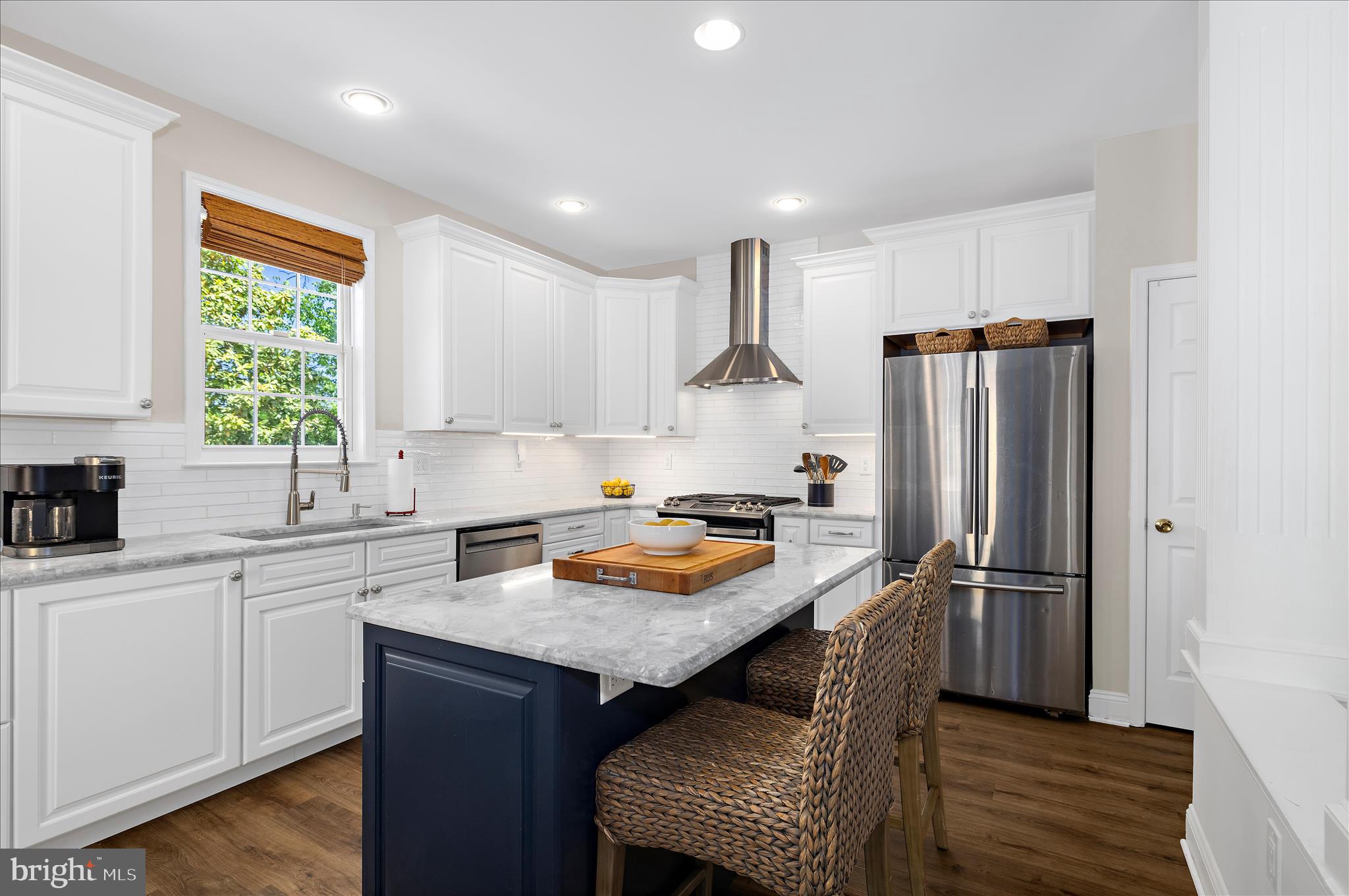 470 Jumpers Hole Road Severna Park, MD 21146 - Photo 4 of 72 a kitchen with stainless steel appliances granite countertop a refrigerator a sink dishwasher a stove and a refrigerator with wooden floor