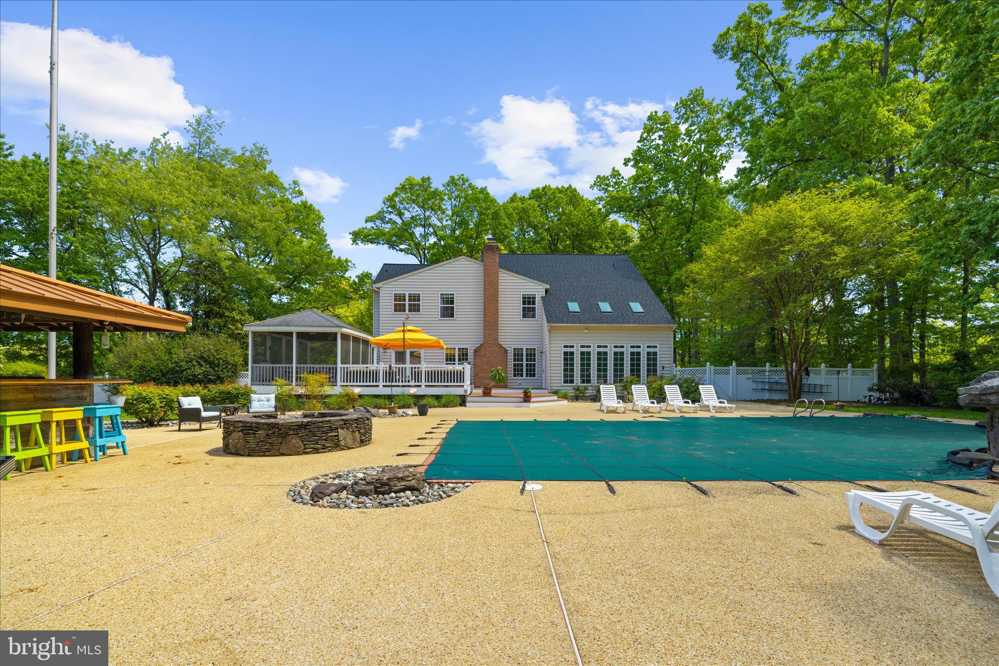 470 Jumpers Hole Road Severna Park, MD 21146 - Photo 58 of 72 a front view of a house with a yard and trees