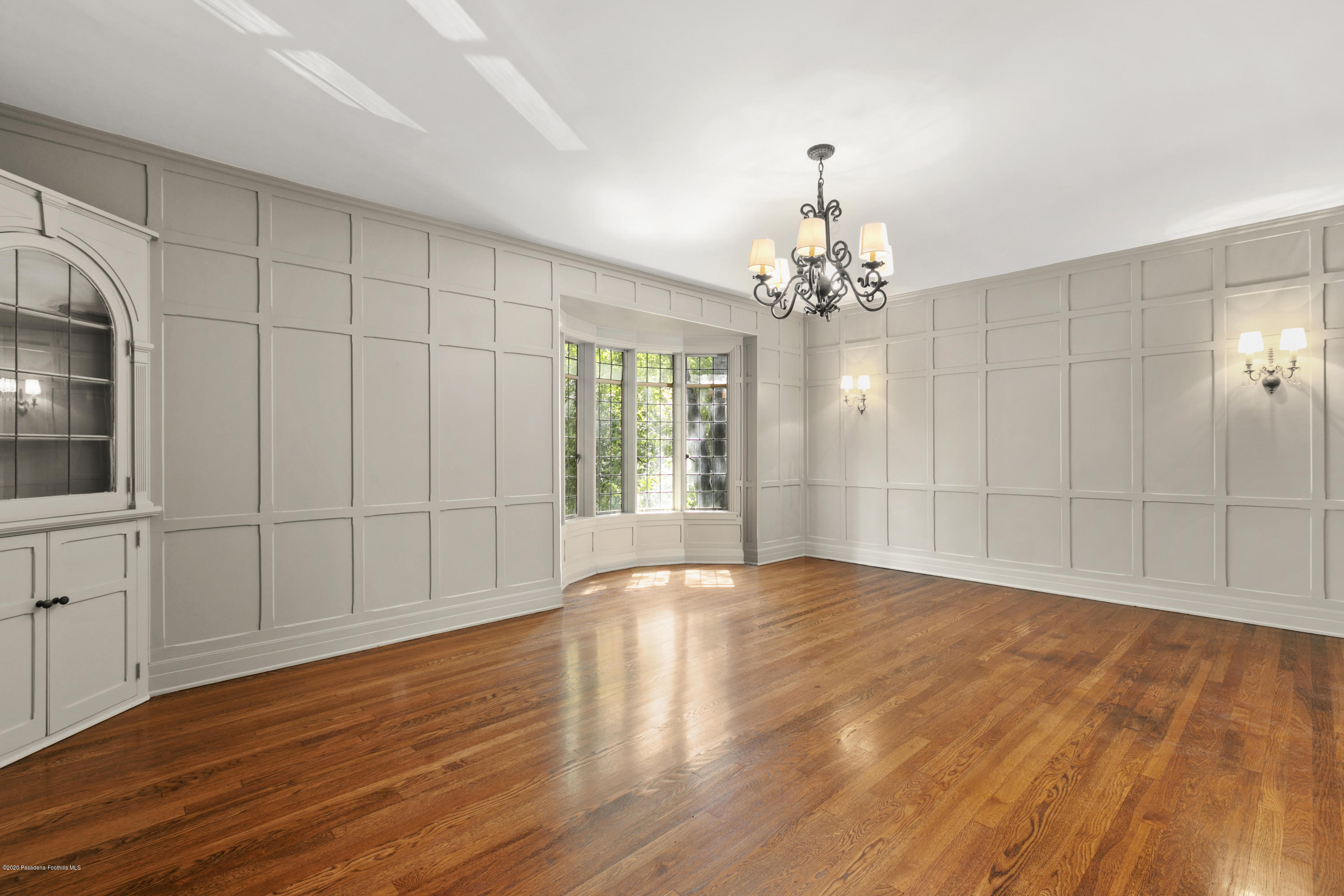 1701 East Altadena Drive Altadena, CA 91001 - Photo 11 of 36 a view of an empty room with wooden floor and a window