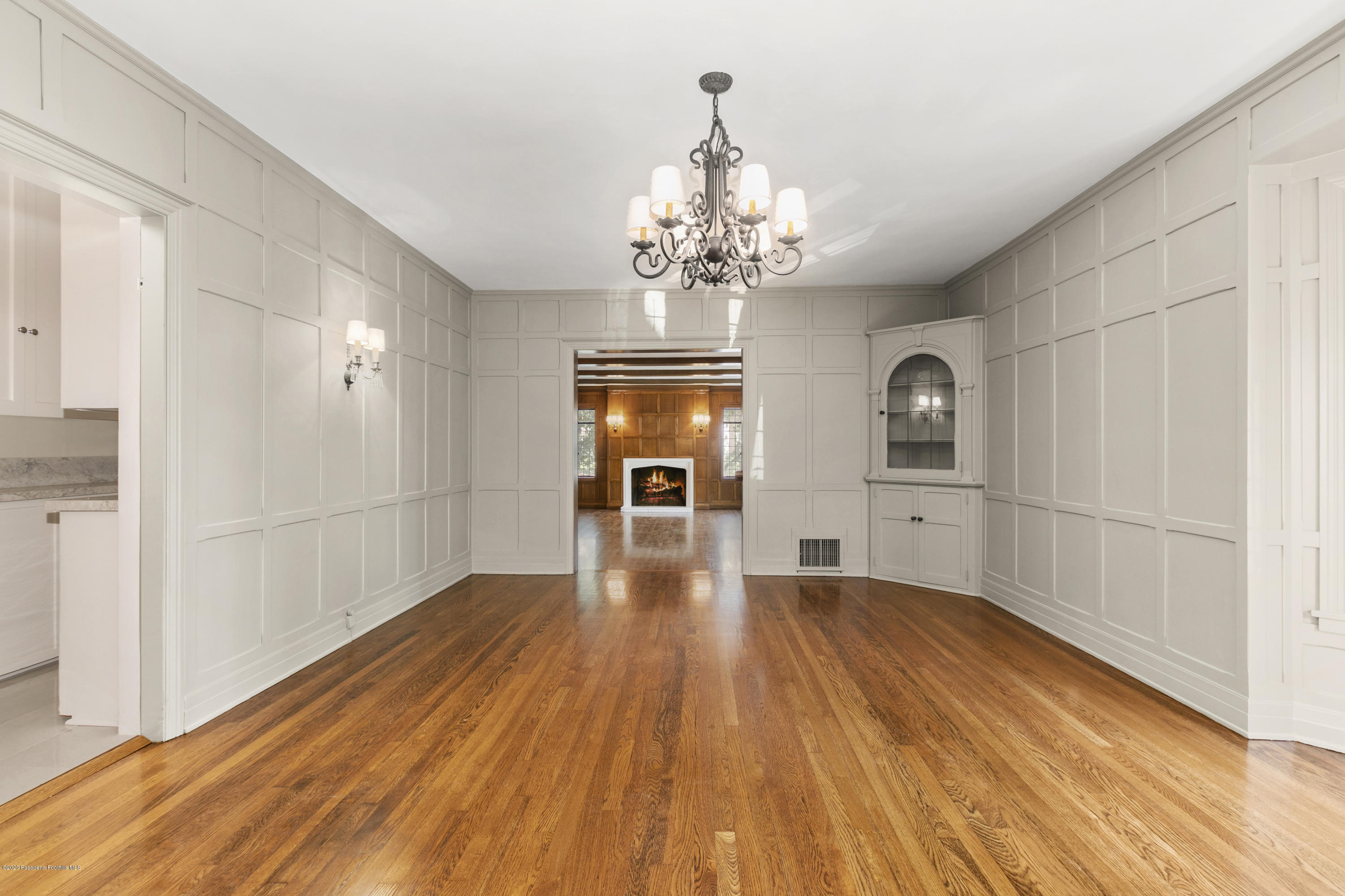 1701 East Altadena Drive Altadena, CA 91001 - Photo 12 of 36 a view of a room with wooden floor cabinet and windows