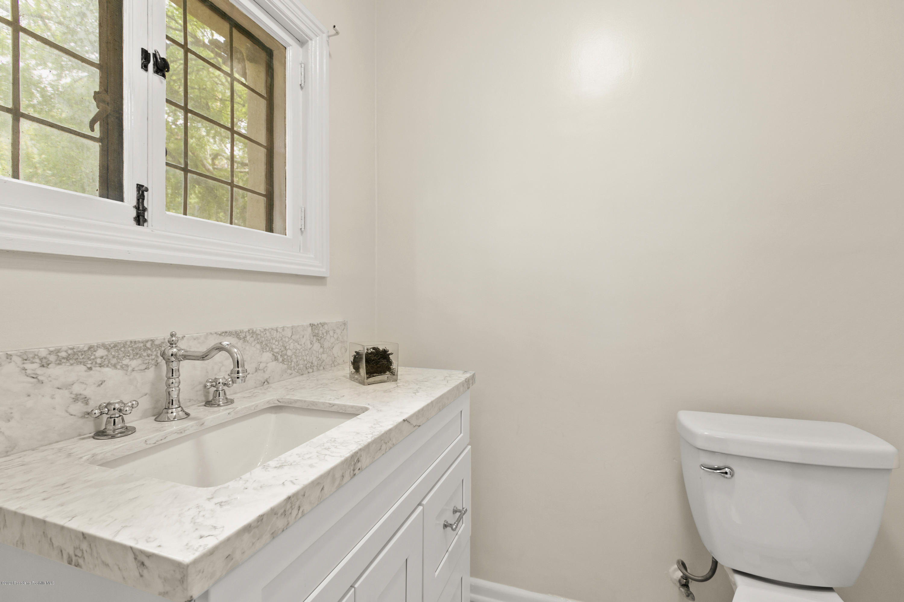 1701 East Altadena Drive Altadena, CA 91001 - Photo 17 of 36 a bathroom with a sink vanity granite and toilet