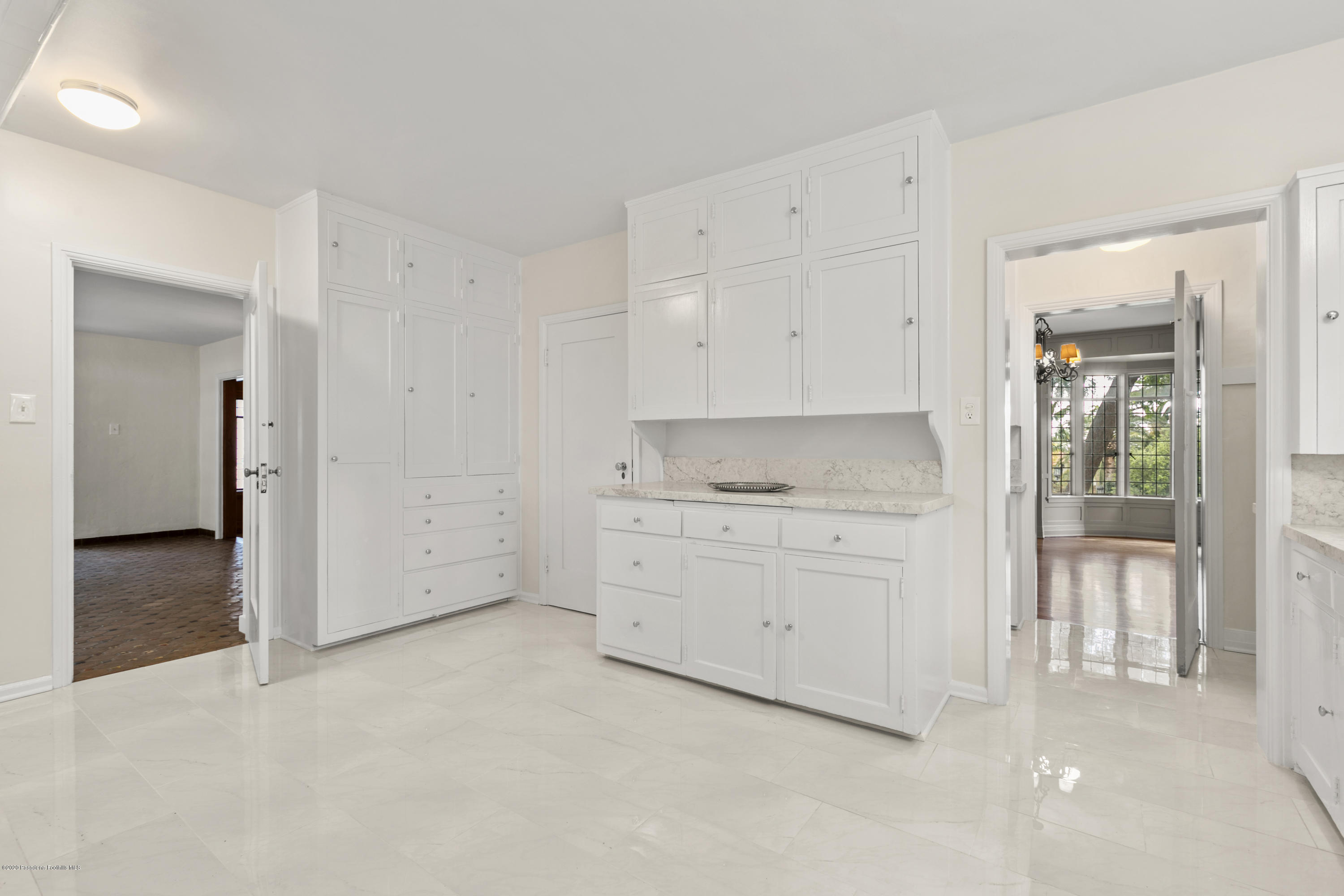 1701 East Altadena Drive Altadena, CA 91001 - Photo 18 of 36 a room with closet cabinets and bedroom view