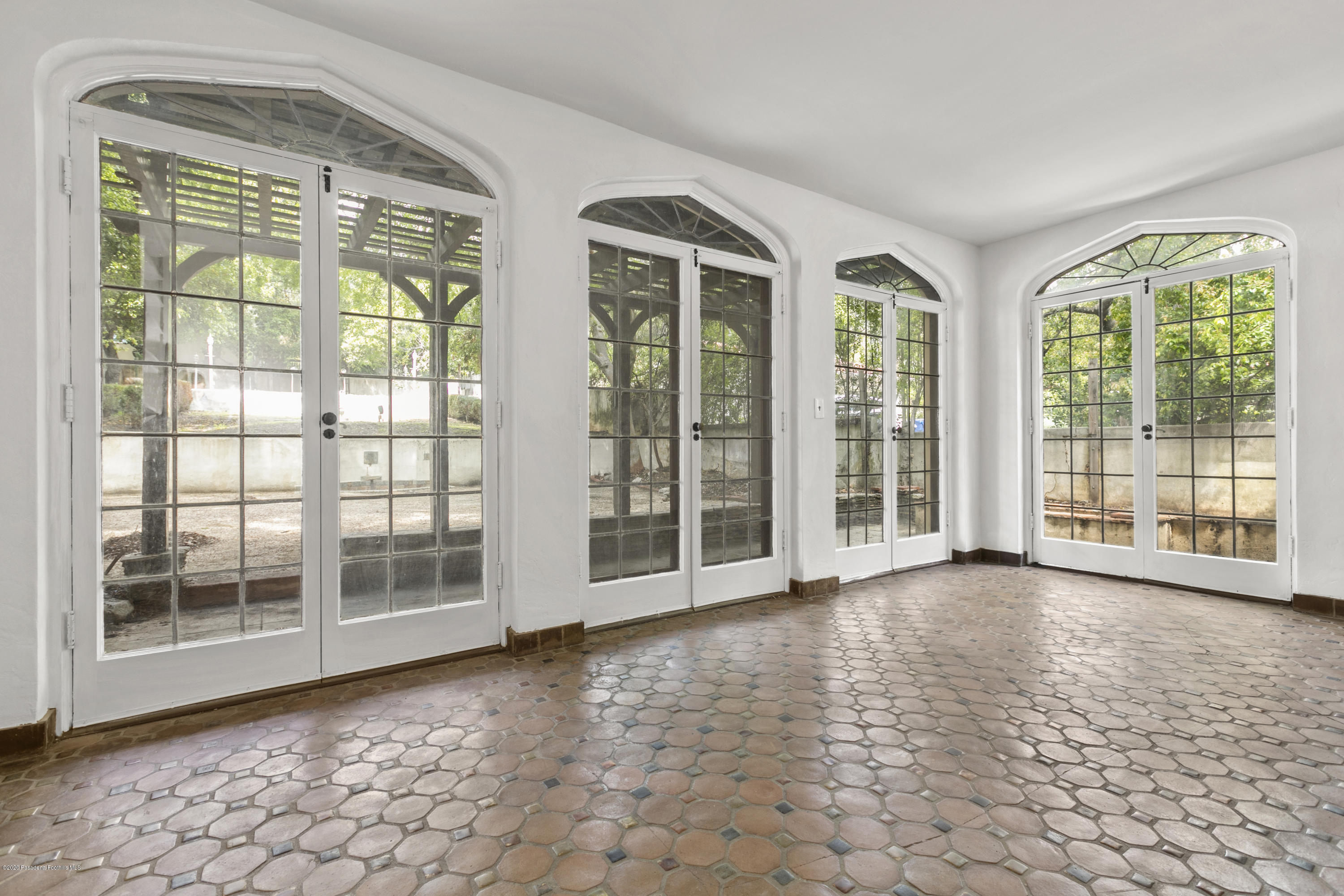 1701 East Altadena Drive Altadena, CA 91001 - Photo 19 of 36 a view of a glass door and an empty room