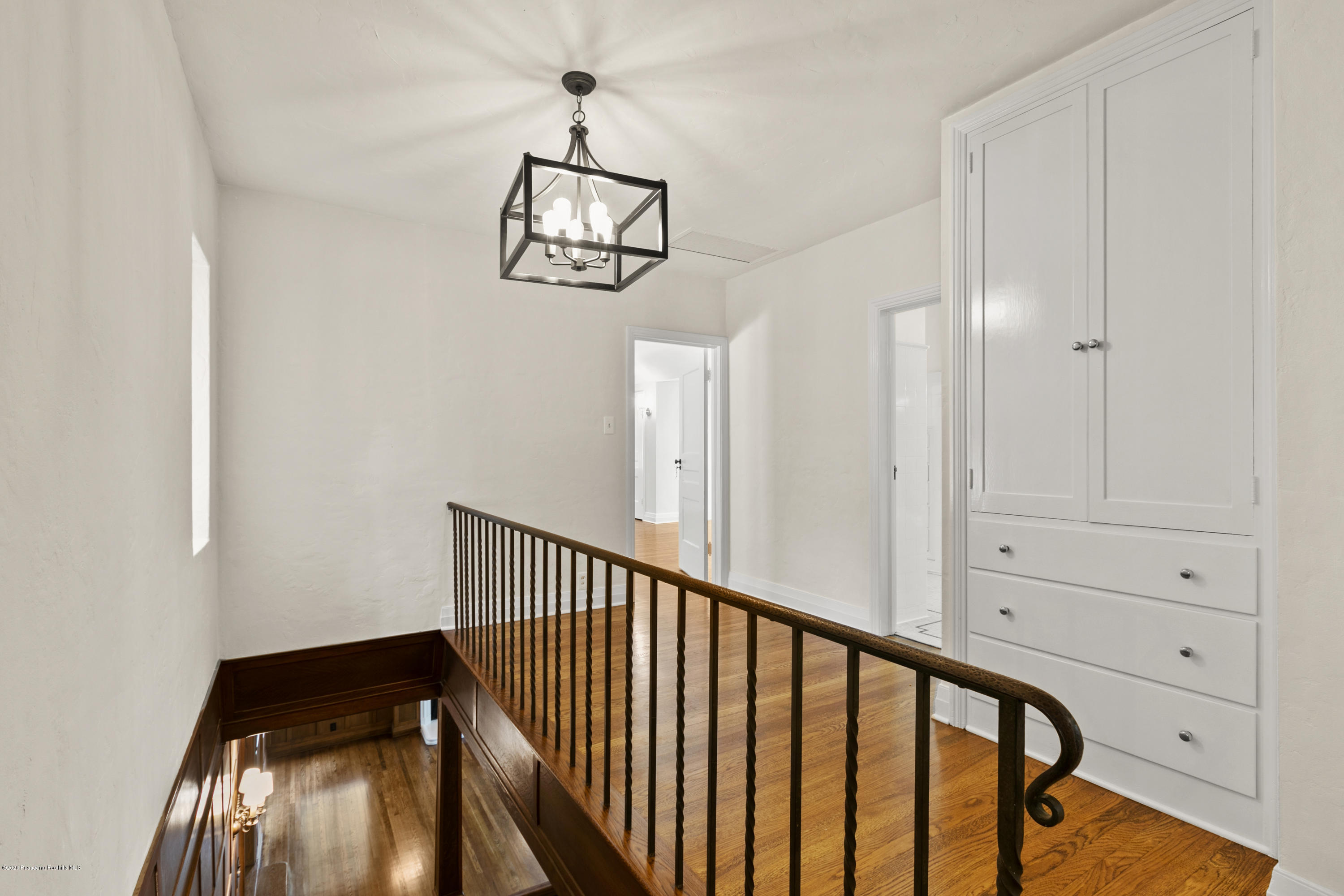 1701 East Altadena Drive Altadena, CA 91001 - Photo 20 of 36 a view of a hallway with wooden floor